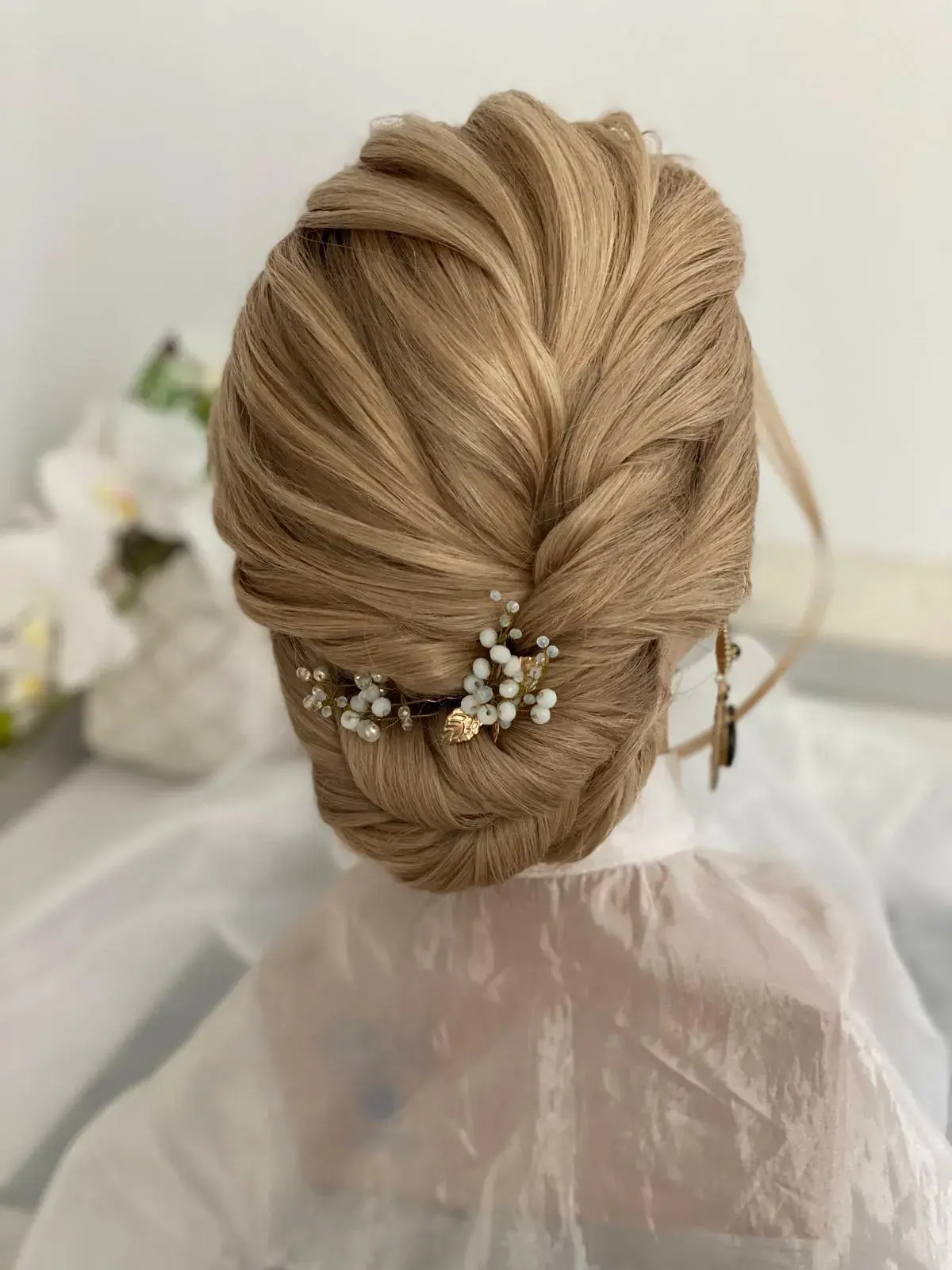 Lucrare semnată de Liuba Trofaniuc, de la cursul Coafuri comerciale rapide